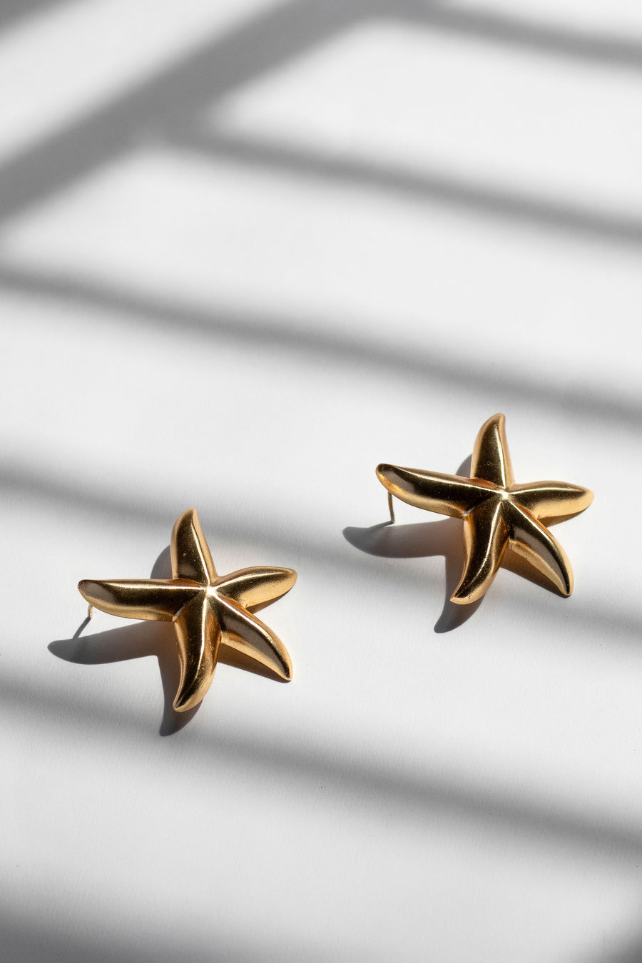 Gold starfish studs