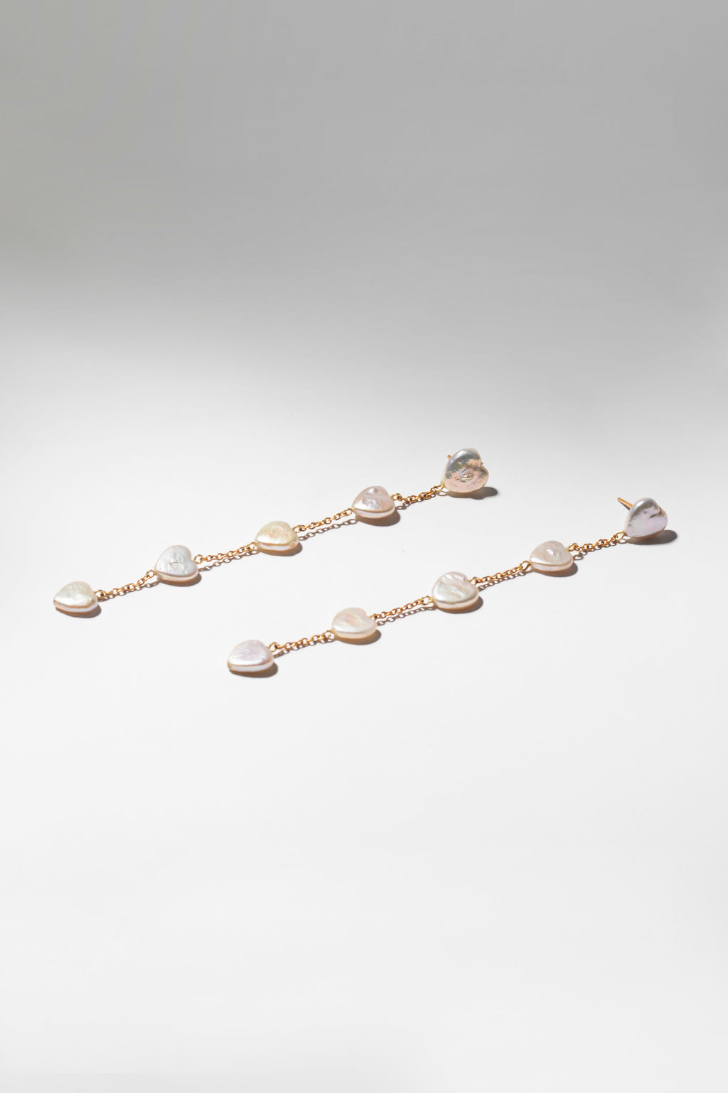 Heart shaped pearl waterfall earrings