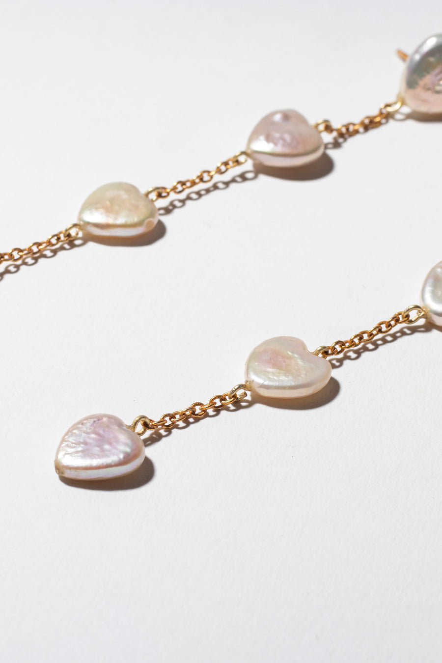Heart shaped pearl waterfall earrings